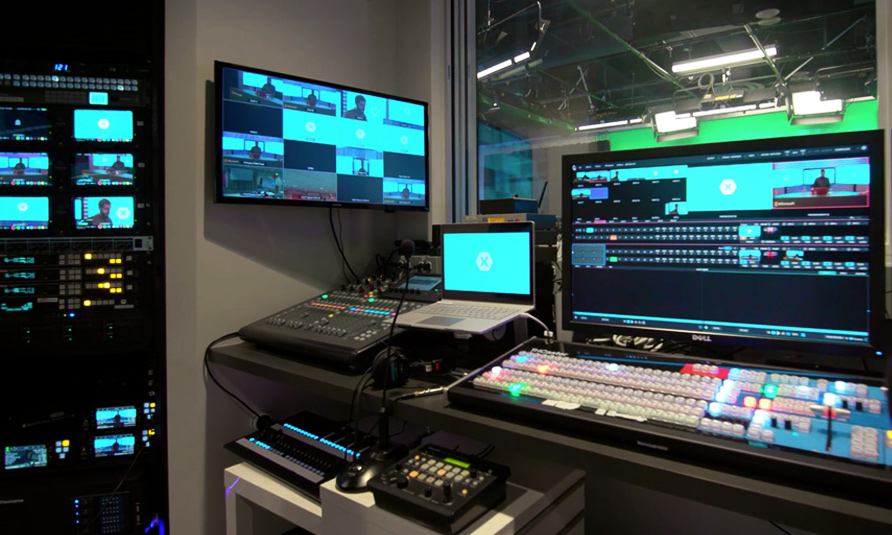Microsoft's Channel 9 control room featuring a NewTek TriCaster 8000, EVO Shared Storage, and other production equipment.