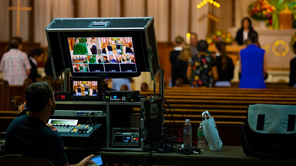 Man at TriCaster in church.