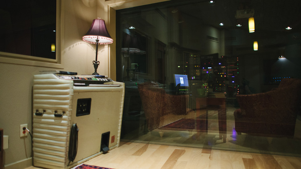Music studio with glass window.