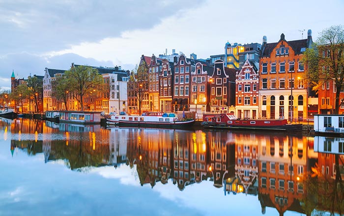 Canal with houseboats in Amsterdam