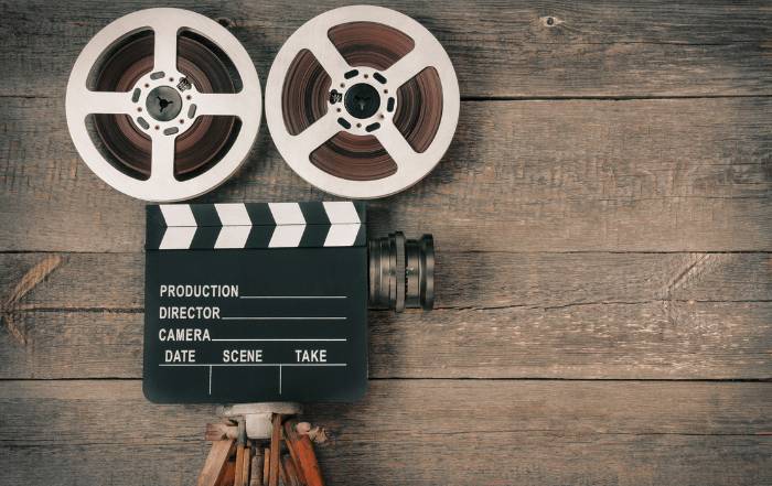 Celluloid Film and marker laying on wood table