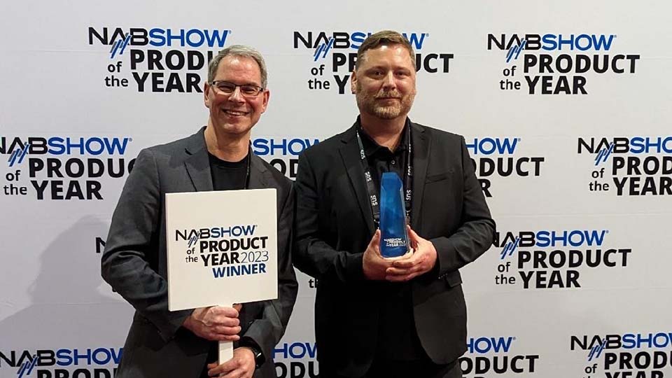 Co-founder and CTO Eric Newbauer (left) and President Ryan Stoutenborough accepting the 2023 NAB Show Product of the Year Award for Cloud Computing & Storage on behalf of SNS.