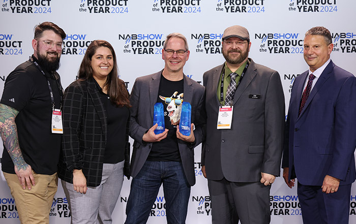 SNS team members accept 2024 NAB Show Product of the Year Awards from NAB's Eric Trabb